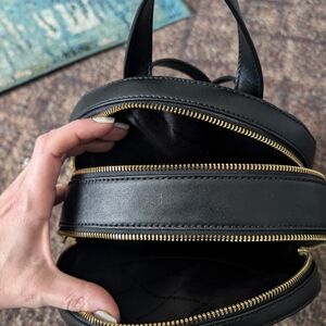 Michael kors black backpack.